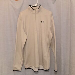Men’s Under Armour 1/2 zip top. Size XLT. Color is cream/ tan